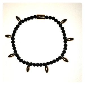 Trina Turk black and gold bracelet